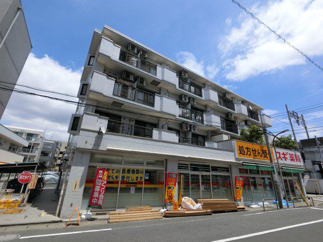 タウンコート丸義