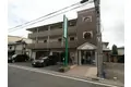 八 番 館