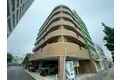 再来しごくビル