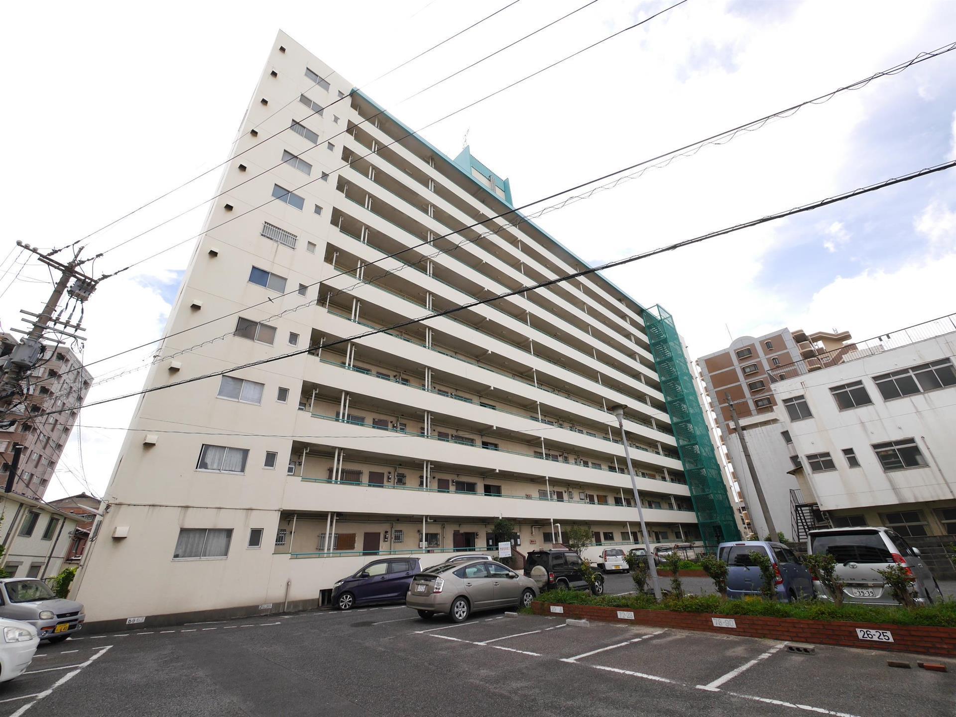 日明コータース